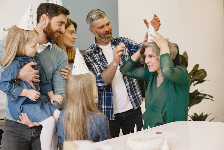 A joyful family birthday celebration with grandparents and children wearing party hats inside a cozy home. - How Health Savings Account-eligible plans work