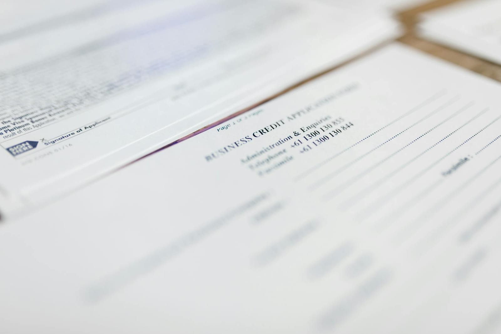 Focused image of business credit application papers, ideal for finance themes. - The Marketplace in your state