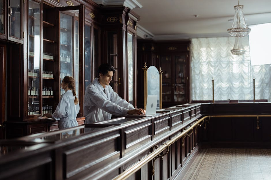 Pharmacists working in a vintage pharmacy setting with old-fashioned decor. health insurance
