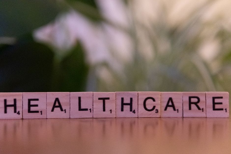 Close-up of Scrabble tiles spelling 'healthcare', ideal for medical themes. health insurance